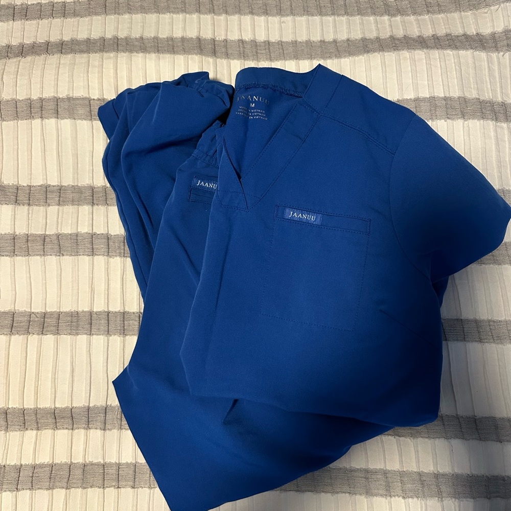 Jaanuu women’s royal blue scrub set